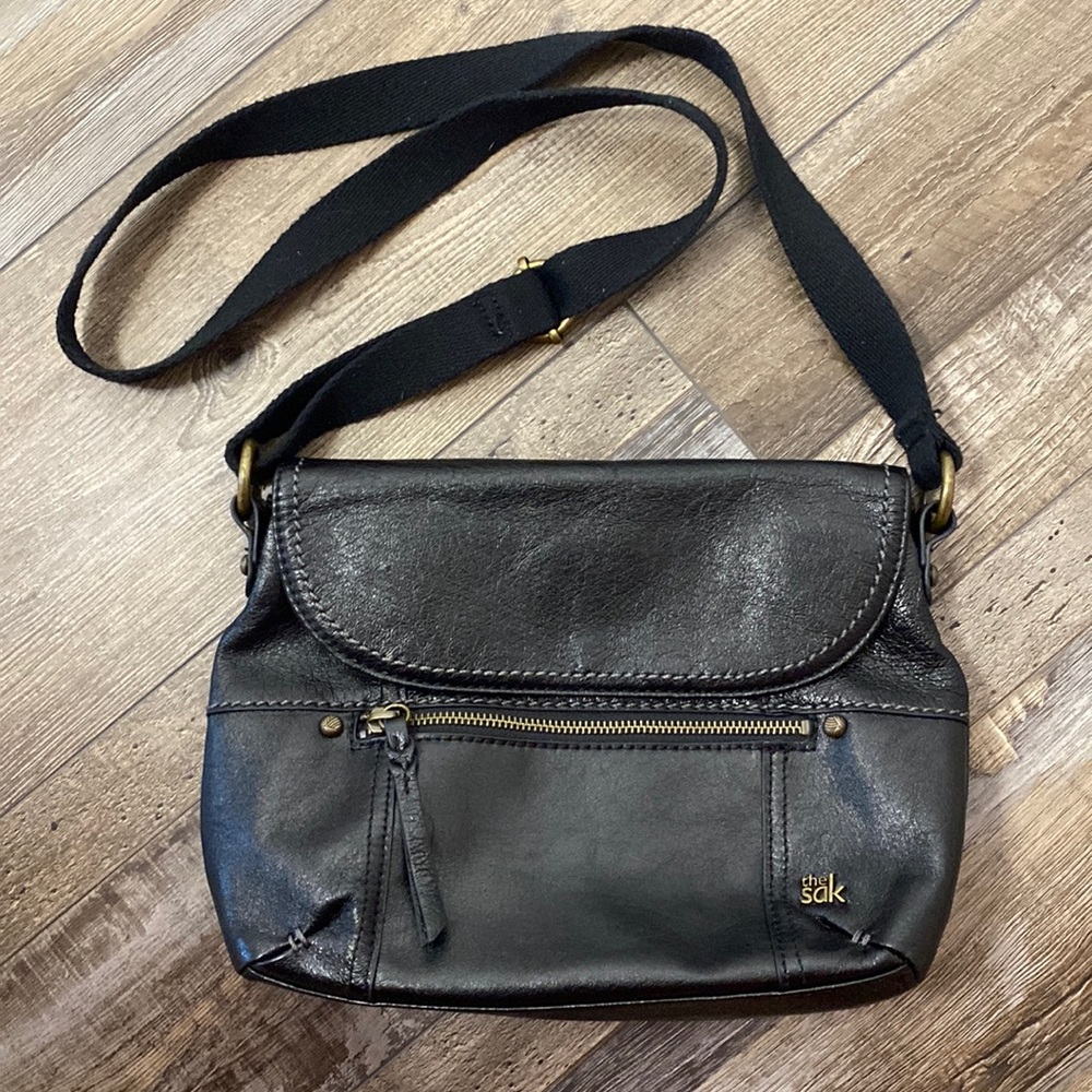 Medium size black leather Crossbody the sock designer handbag soft and new